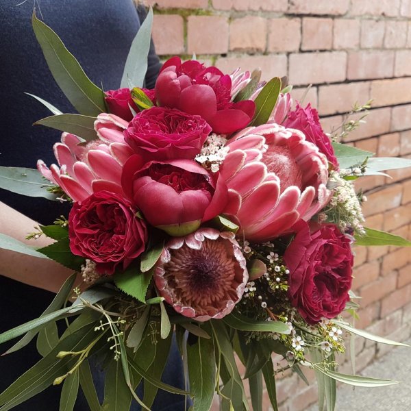 Peony and protea wedding bouquet