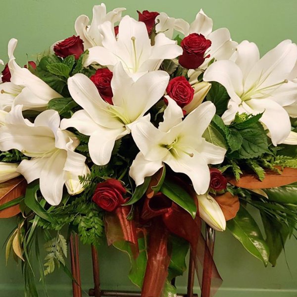 Classic lily casket spray